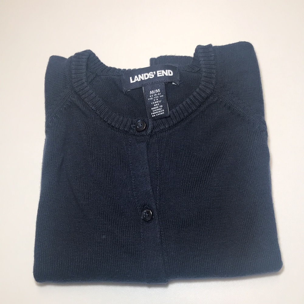 Uniform bundle - short sleeve polo and a sweater.